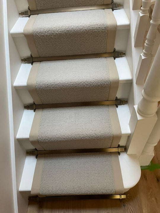 Beige wool loop pile runner with gold corron border