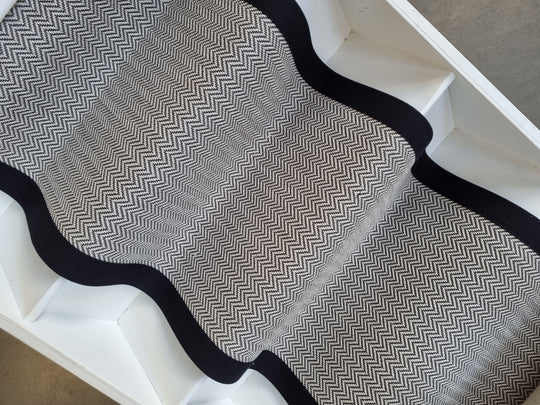 Herringbone stair runner with black border