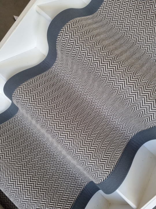 Grey and white herringbone runner with whipped edge