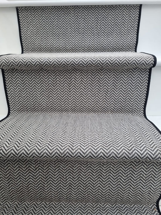 A sisal herringbone black and white runner