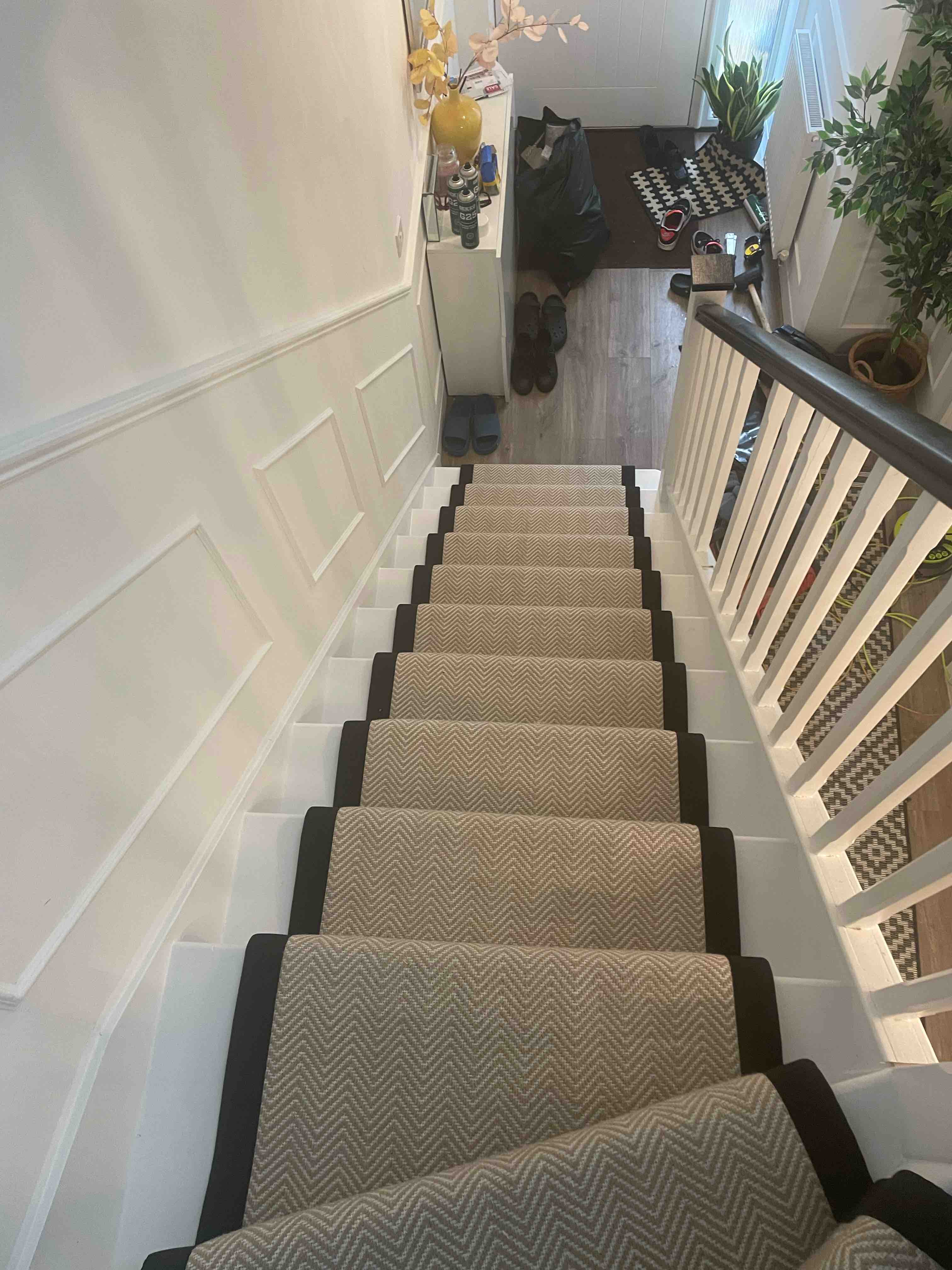 Champagne herringbone stair runner with a brown cotton border