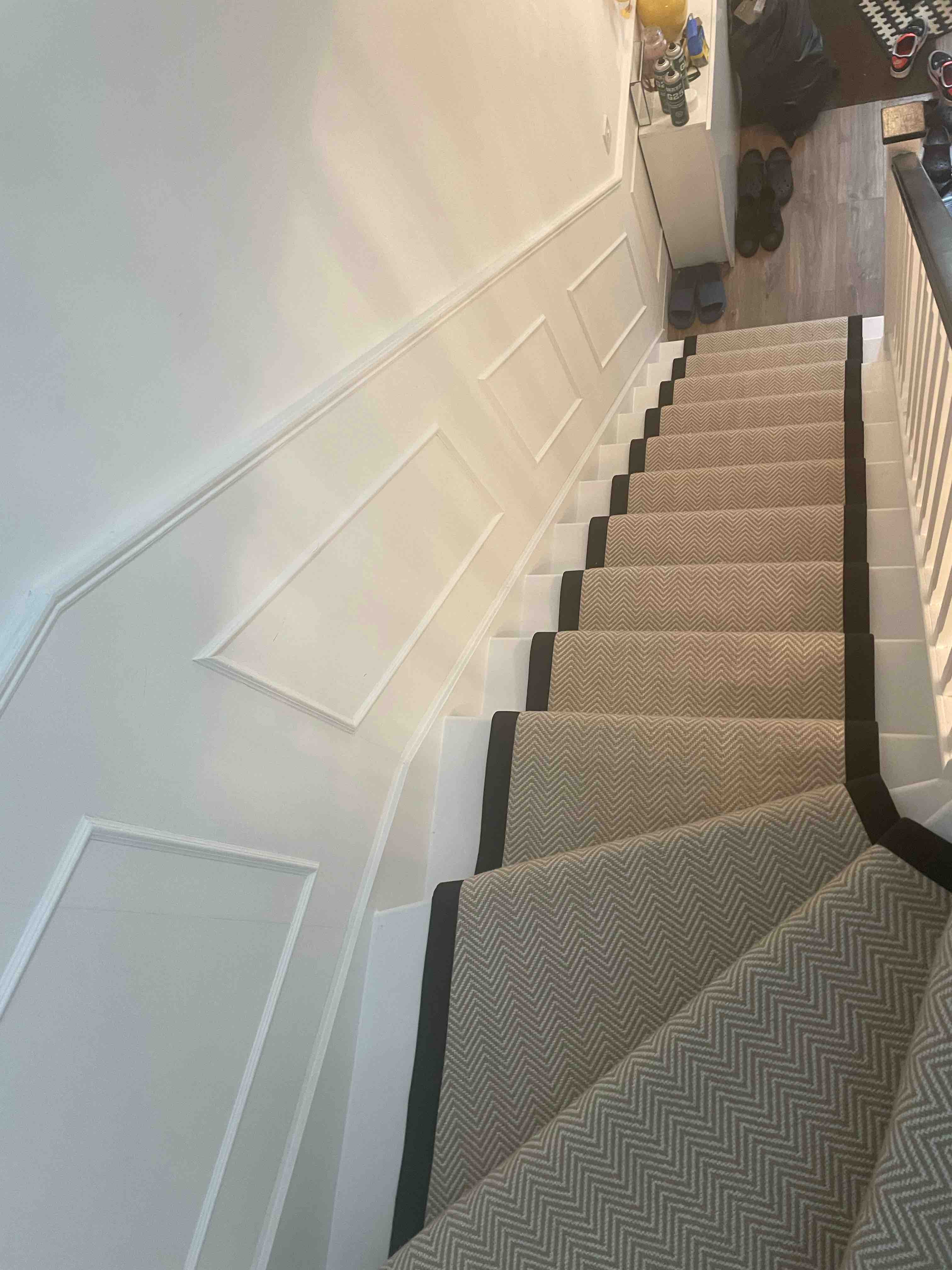 Champagne herringbone stair runner with a brown cotton border