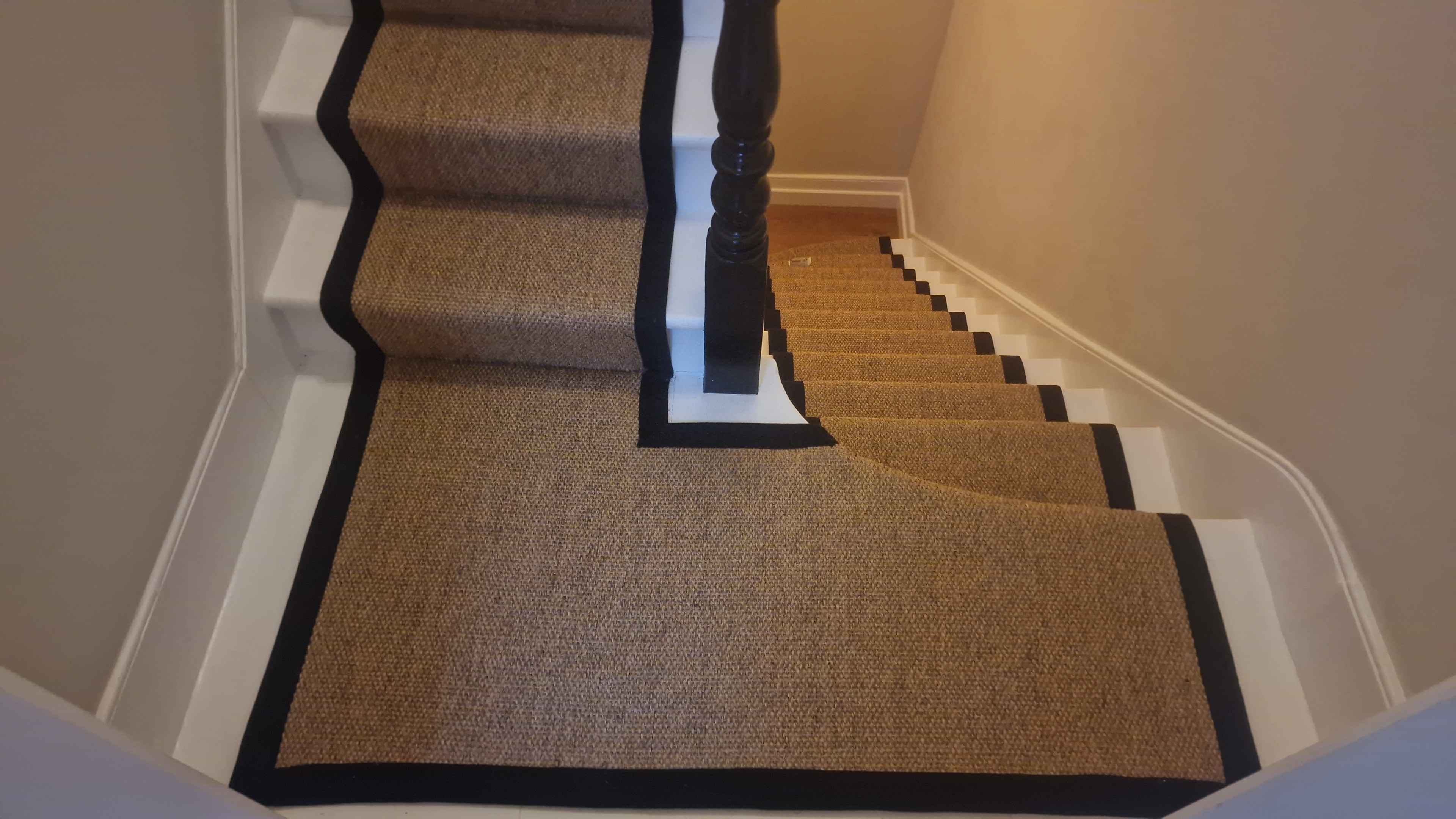 Sisal bouclé stair runner with a black cotton border